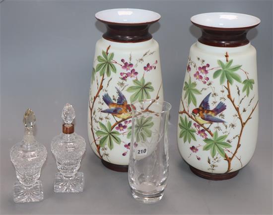 A pair of opaque glass vases, cut glass scent bottles and an etched glass